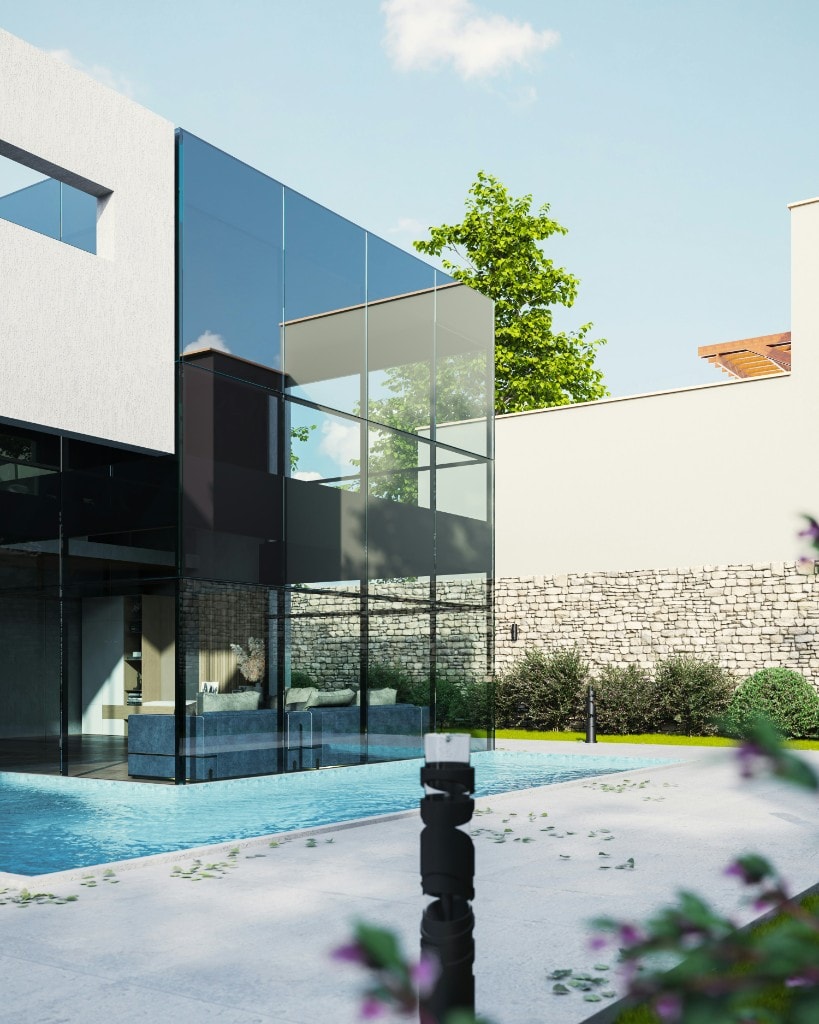 A glass and masonry volume with courtyard pool